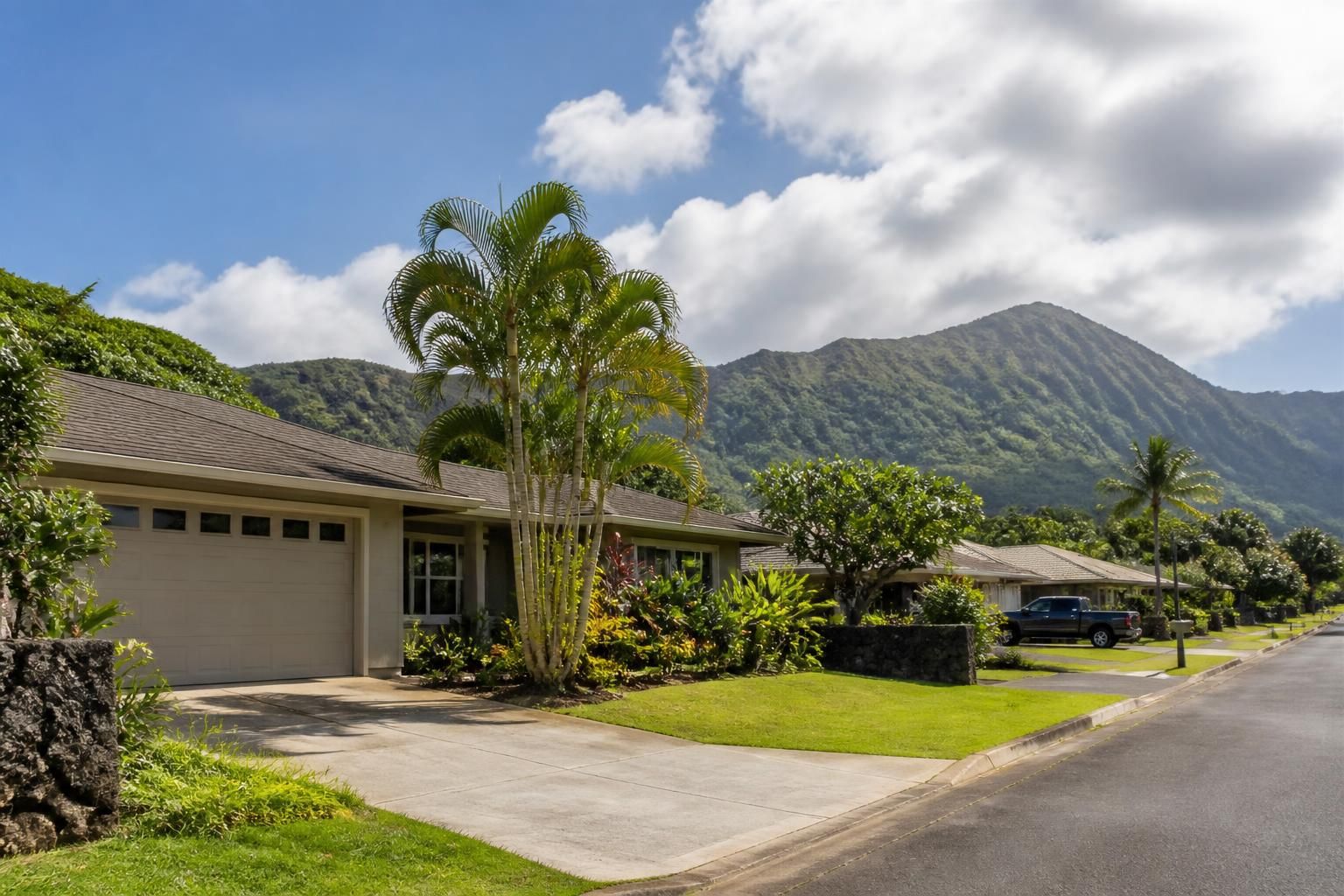 Kaneohe neighborhood with lush greenery and well-kept homes.