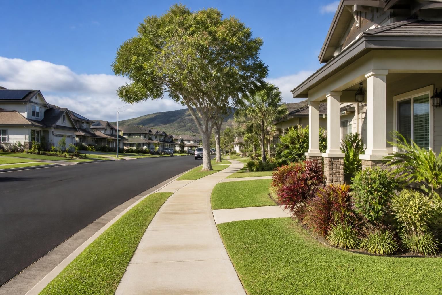 Pearl City suburban street with tidy homes and clean sidewalks.